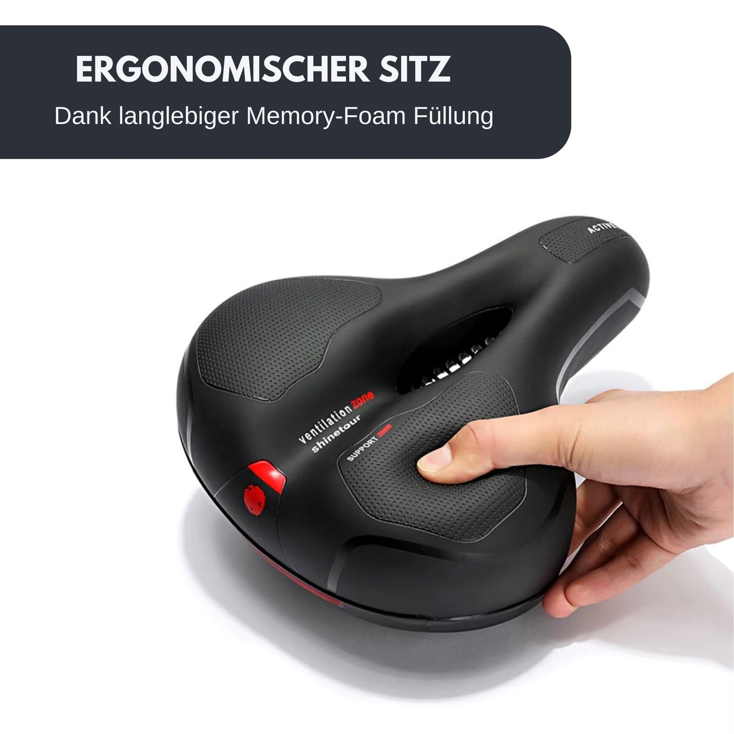 Nahaufnahme: Hand drückt auf den ergonomischen Damensattel und demonstriert weichen Memory-Schaum sowie hohen Fahrkomfort.